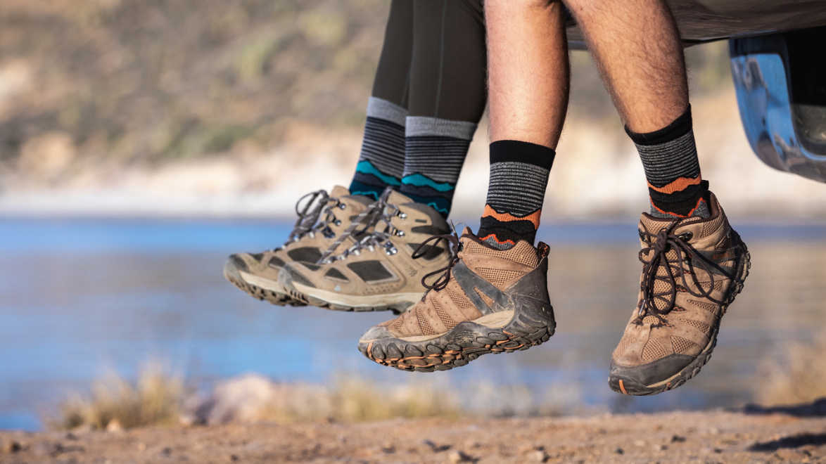 2 people wearing compression socks